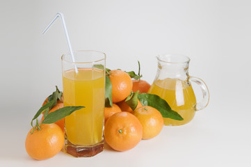 Naklejka na ściany i meble tangerines glass and jug of glass