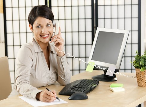 Office worker talking on phone