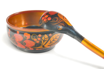 Painted wooden plates and spoons