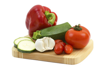 fresh vegetables on a wooden cutting board