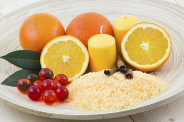 orange bath salt with fresh fruits - beauty treatment