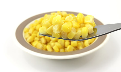 Fork filled with corn