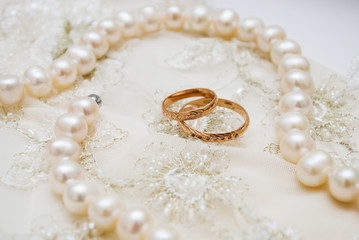 wedding rings and pearls