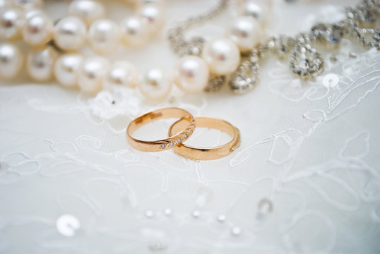 wedding rings and pearls