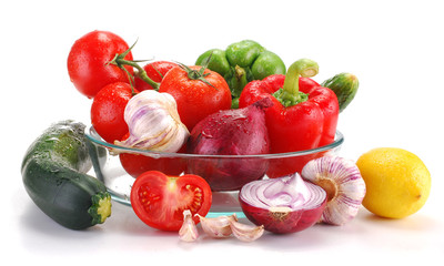 Composition with raw vegetables isolated on white