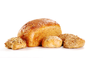 Loaf of bread and rolls isolated on white