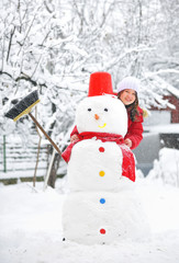 snowman and young girl