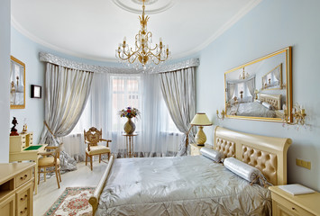 Classic style luxury bedroom interior in blue and silver colors