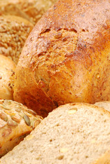 Composition with loaf of bread and rolls