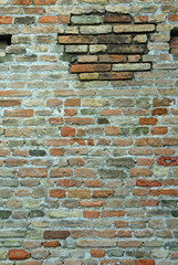 Italy Ravenna, medieval stone and brick wall