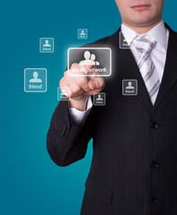 Man pressing social network button