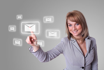 woman pressing e-mail icon