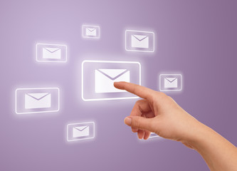hand pressing e-mail icon