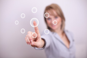 Woman pressing group of buttons