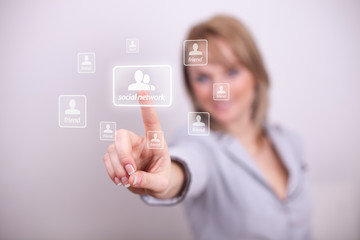 Woman pressing social network button