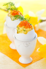 Scrambled egg with chives and red caviar