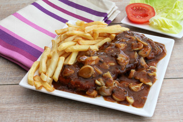 Jägerschnitzel mit Pommes Frittes