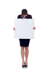 business woman holding blank sign