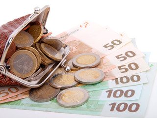 Euro money in purse, isolated on white