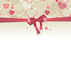 White greeting card with red bow and stylized hearts