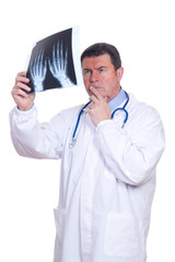 worried doctor with x-ray