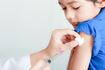 Boy and vaccine syringe - 29353597