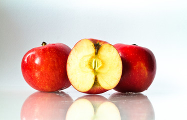 Fresh red apple on white background