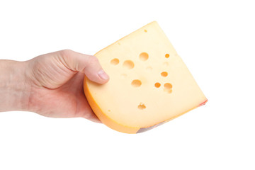 piece of cheese in a human hand