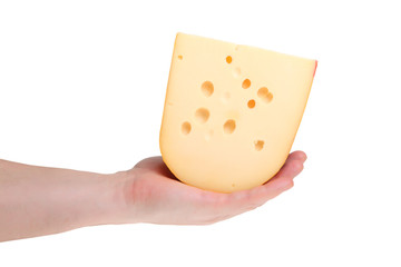 piece of cheese in a human hand