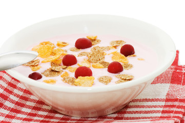 Yoghurt with berries isolated on white background