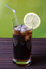 Cola with green background