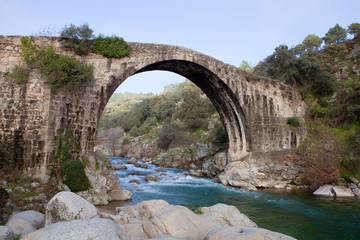 Fototapeta na wymiar Big bridge with waterfall