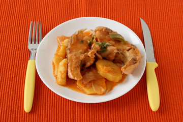 boiled fish in sauce with potato