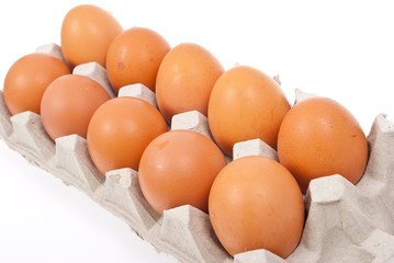 Brown eggs in box