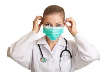 Medical doctor woman in uniform with stethoscope isolated
