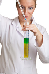 Isolated scientist woman in lab coat with chemical glassware