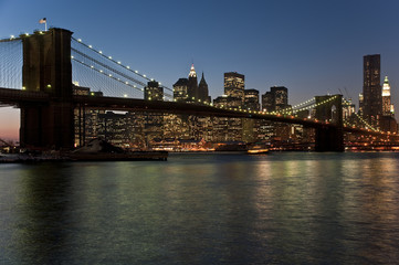 Brooklyn Bridge and Manhattan skyline at dusk (New York City)