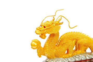 Golden dragon statue isolated