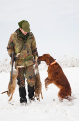 Hunter getting the hare from the dog