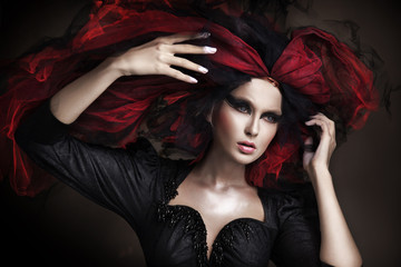 Portrait of beautiful girl with dark make up and amazing style