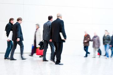 blurred trade fair visitors