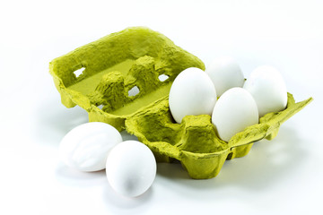Eggs in the box isolated on white