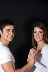 Loving couple touching hands