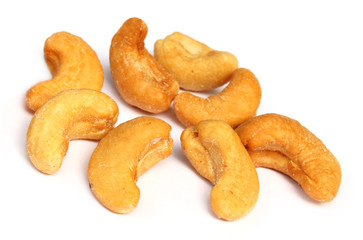Cashew nuts over white background