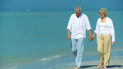 Healthy Seniors Walking the Beach filmed at 60FPS