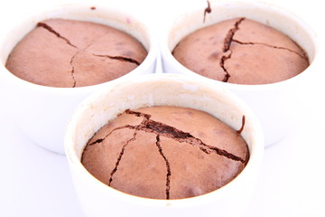Chocolate soufflés on white background