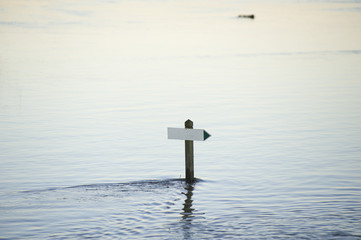 flooded roadsign
