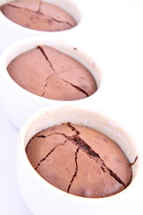 Chocolate soufflés on white background