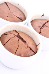 Chocolate soufflés on white background