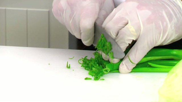 cutting spring onions